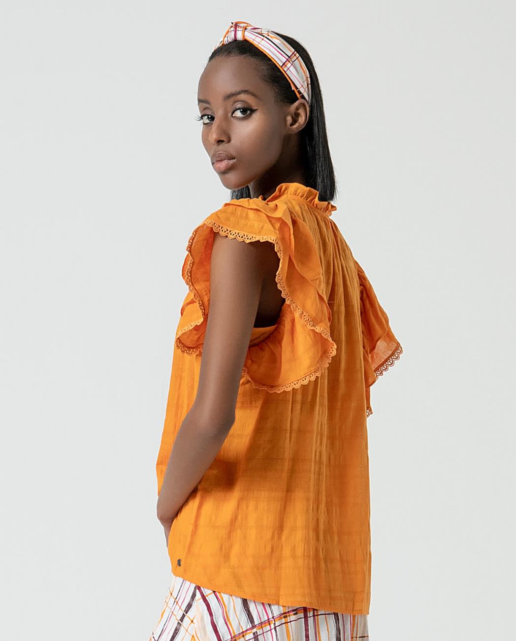 Blusa con volantes Surkana